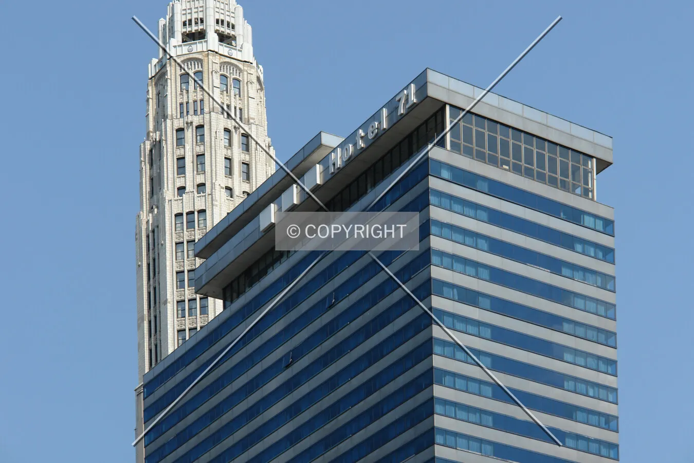 Upper part of the skyscraper including the Hotel 71 logo