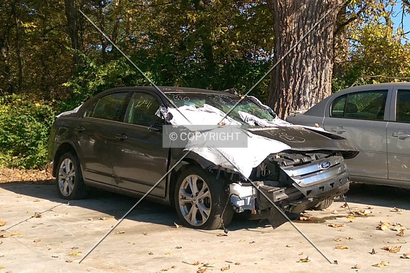 A damaged Ford Fusion; October 21, 2014
