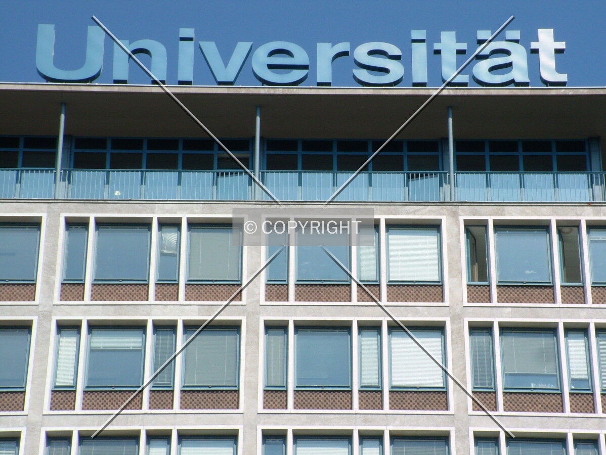 University lettering on the high-rise's rooftop
