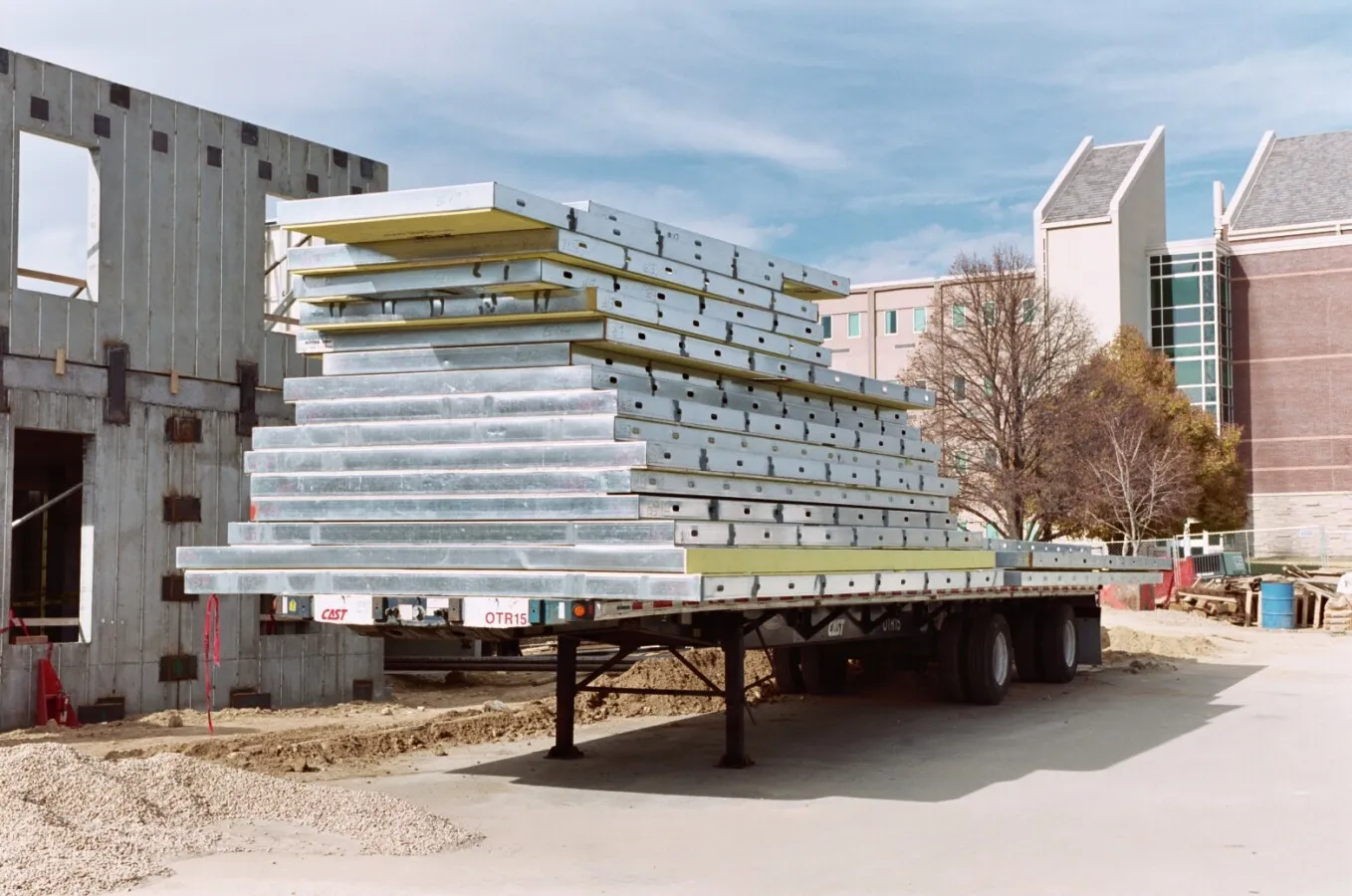 Wall panels stacked on a flatbed trailer