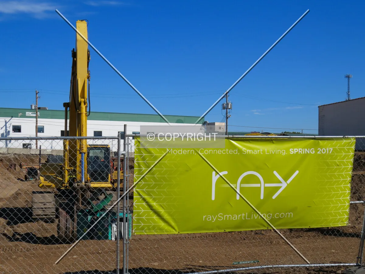 Project banner along Charles Avenue