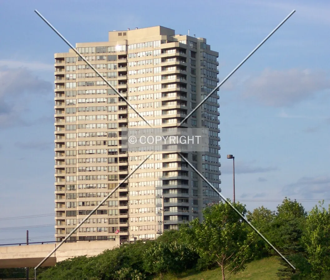 The top segment of the tower, as seen from across Riverside Drive, facing northeast
