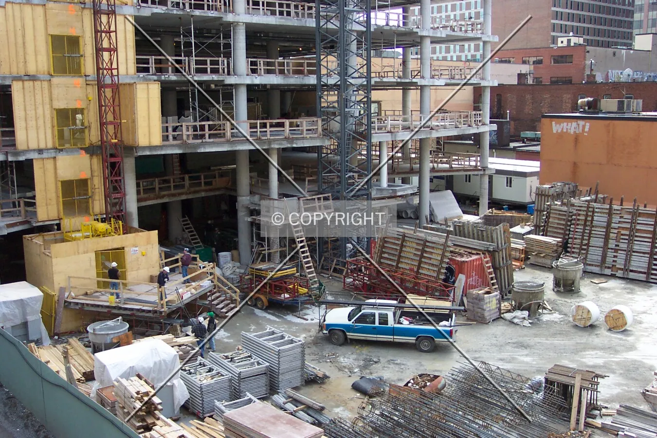 Looking down at the base of the building and the construction site