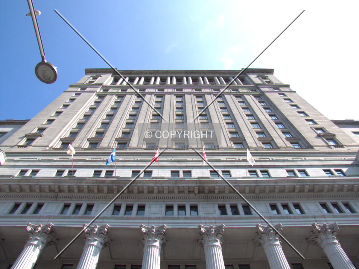 Looking up from across Rue Metcalfe