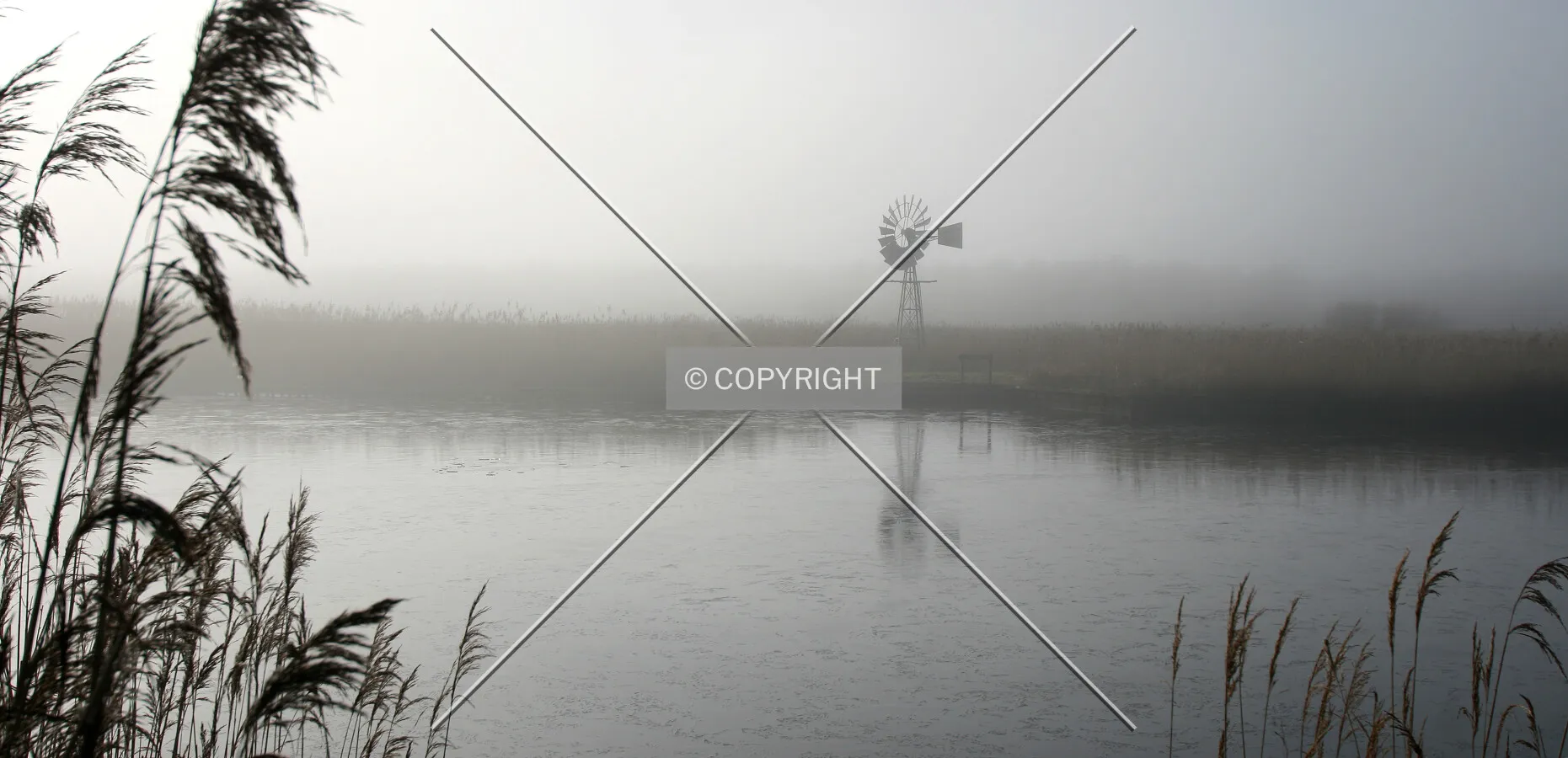 Mill in fog