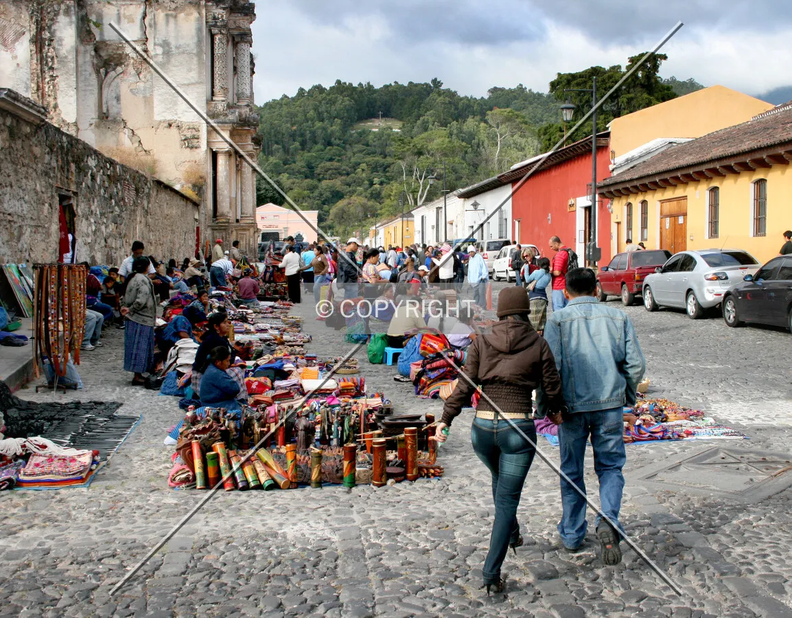 Tourists visit a street market