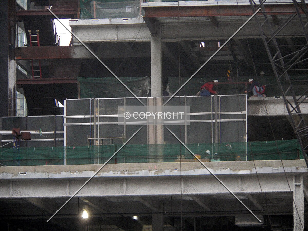 Windows being installed on about the 4th floor on the western side of the southern face
