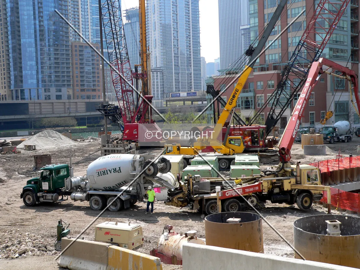 View to the southwest from lower Lake Shore Drive as concrete is pumped into a caisson hole