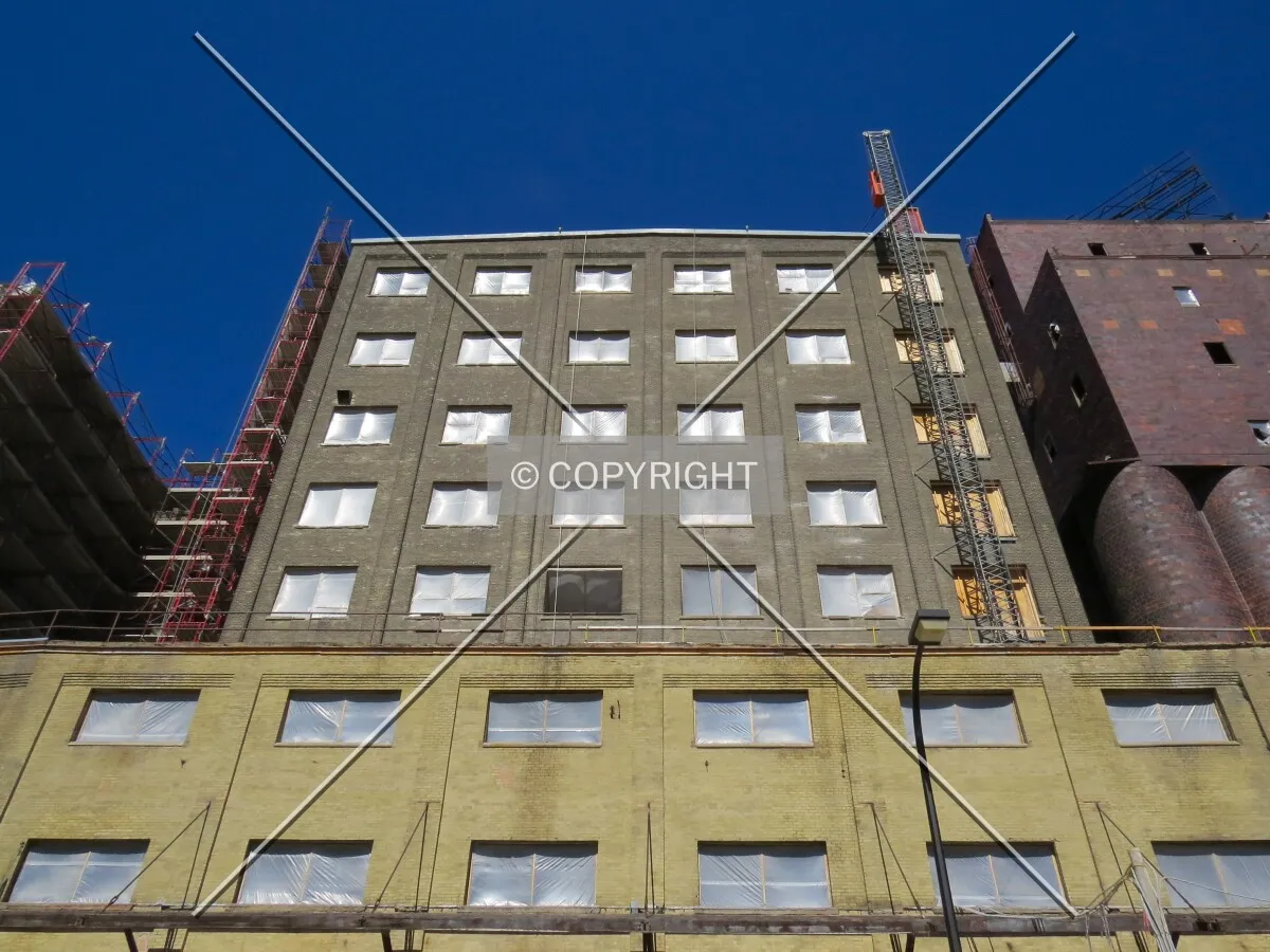 Looking up from Main Street SE during renovation into lofts