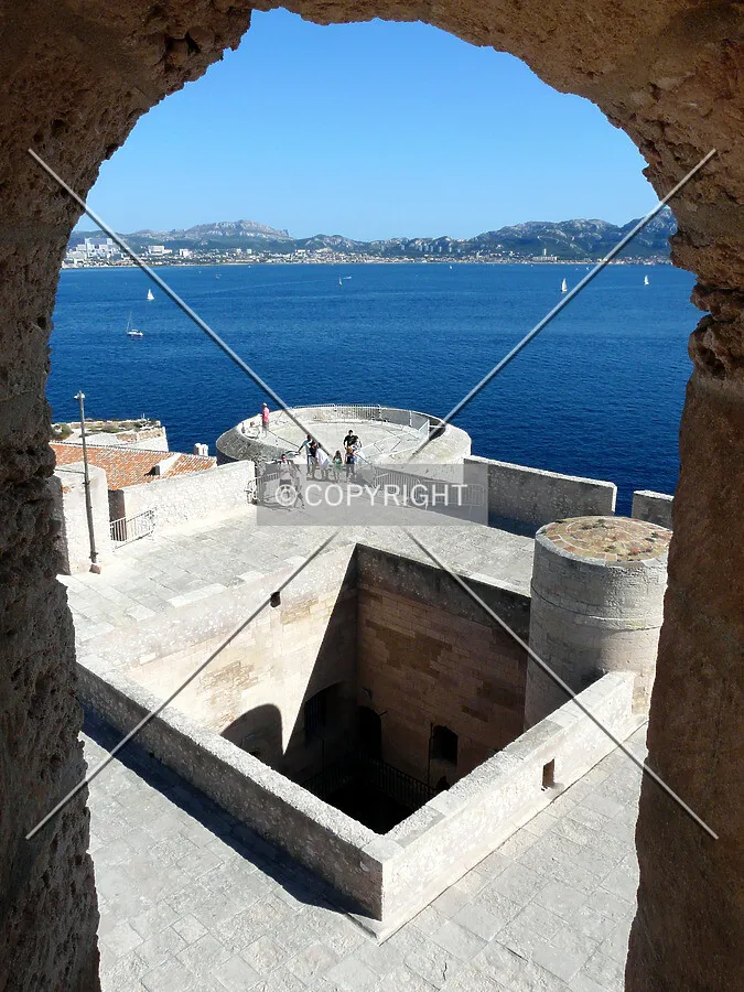 View of the castle through an opening in the highest tower's wall