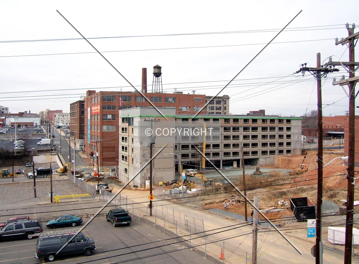 View from the southeast along 6th Street with The Gallery Lofts to the left