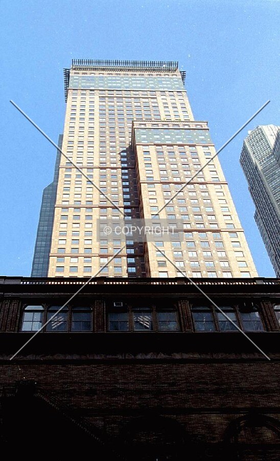 View from 7th Avenue, with Carnegie Hall in the shadows at the bottom