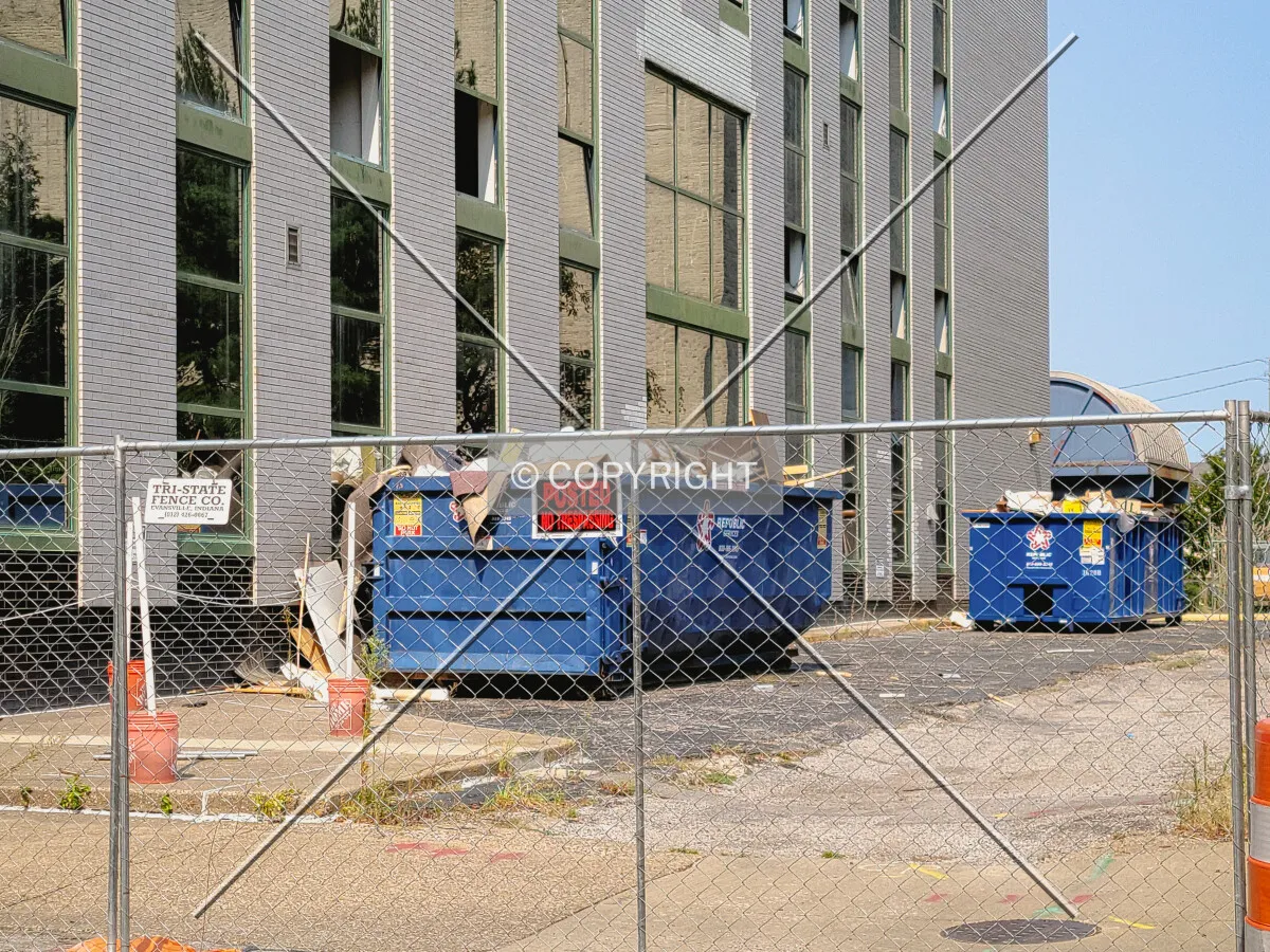 Fencing and dumpsters set up for demolition; September 11, 2021