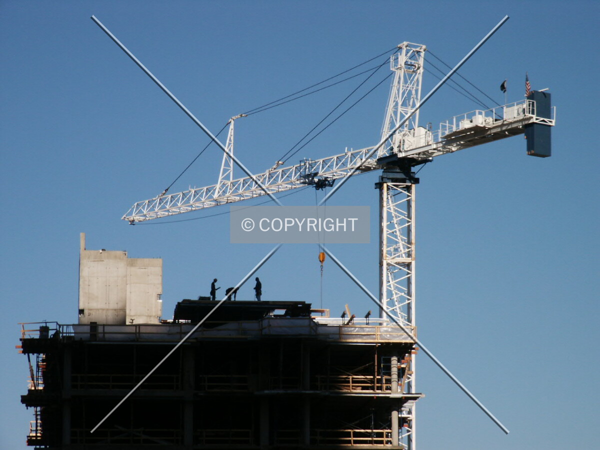 Workers standing on the roof; 16 July 2003