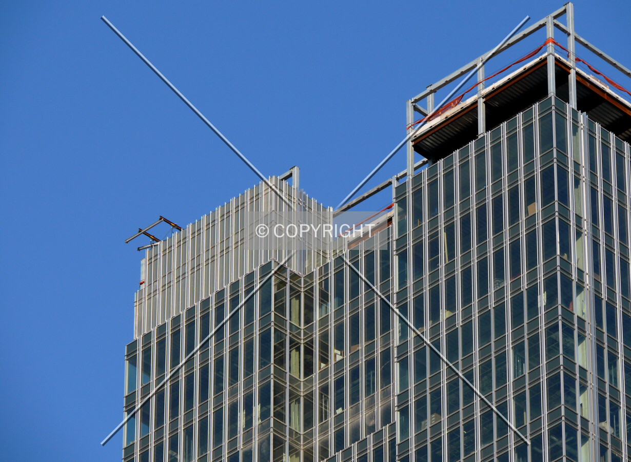 Cladding being installed on the western part of the crown