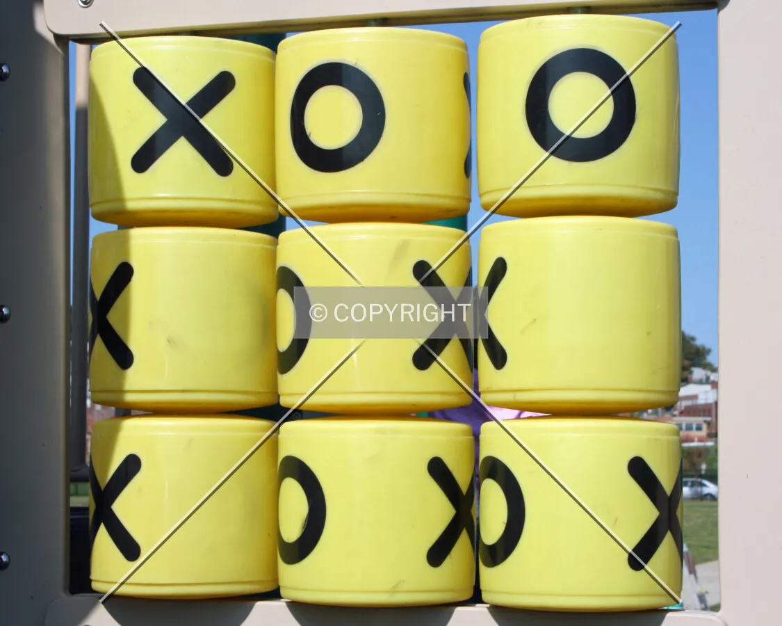 A Tic-tac-toe game on the south side of the playground