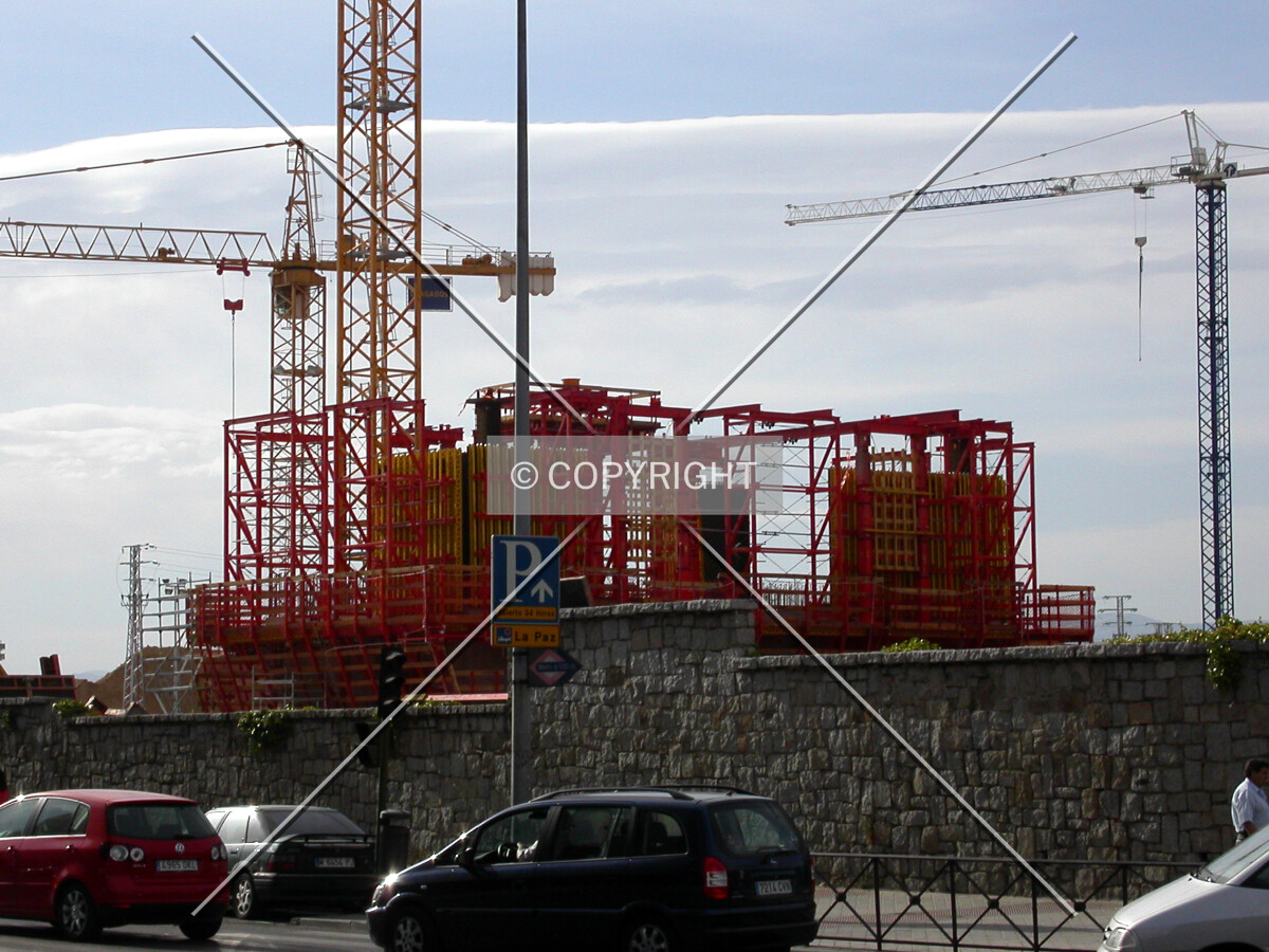 The building starting to rise over the street