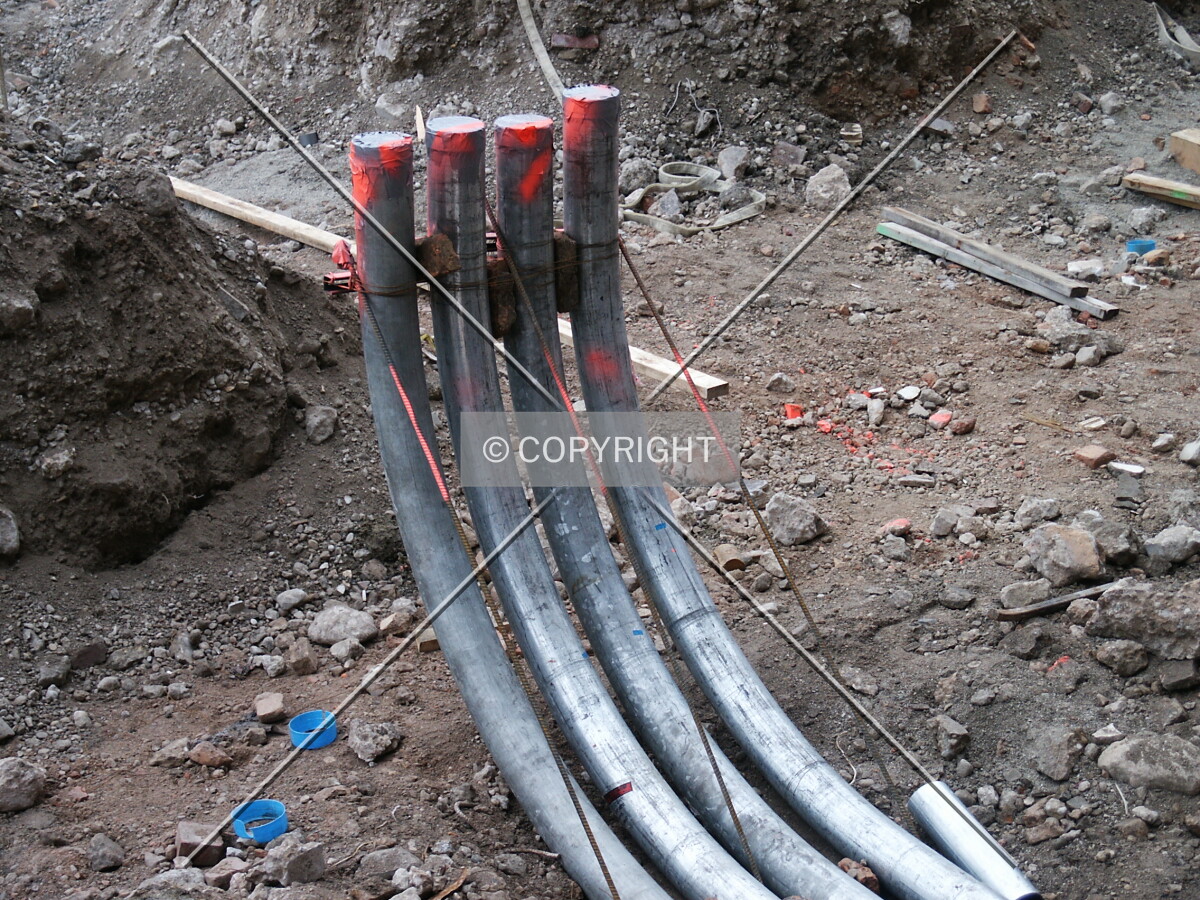 Curved pipes off the alley