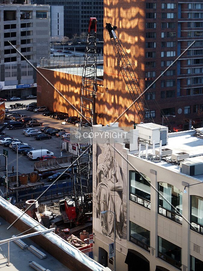 Looking down from a parking garage northeast of the site