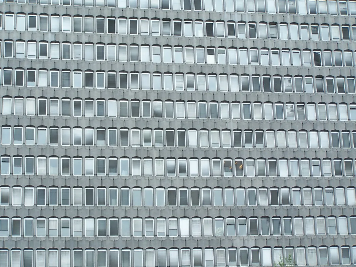 Stone facade with its rows of windows