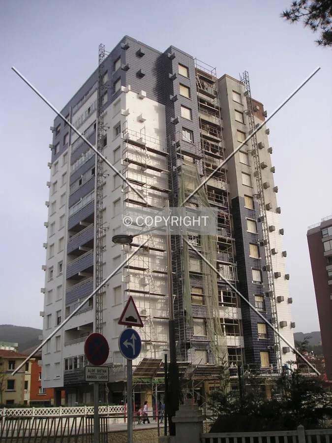 View from the road to the port of the building under renovation