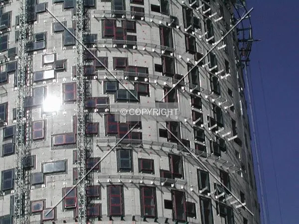 The sun shining on the unfinished facade