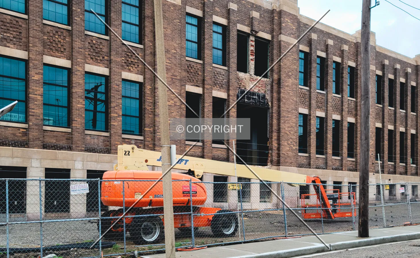 Equipment sitting outside of the east facade during renovation; September 4, 2021