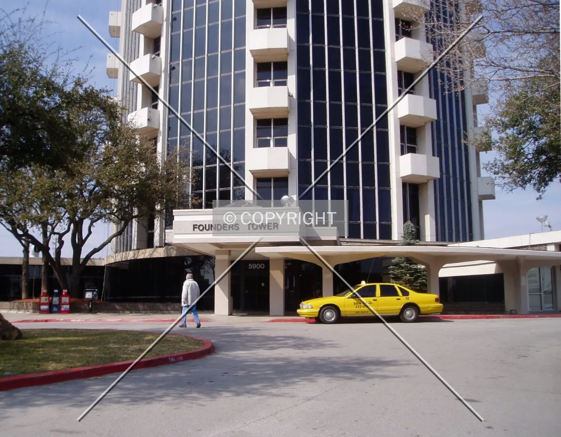 The main entrance and base of the building from the southwest