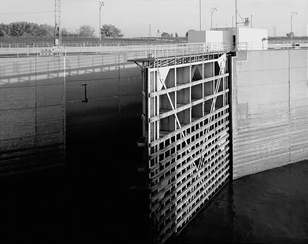 Detail view of main lock miter gate in partially opened position, looking northwest
