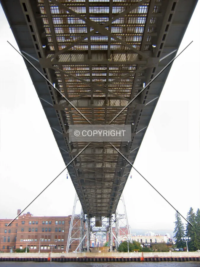 Under the partially-raised span, from the Minnesota Point side
