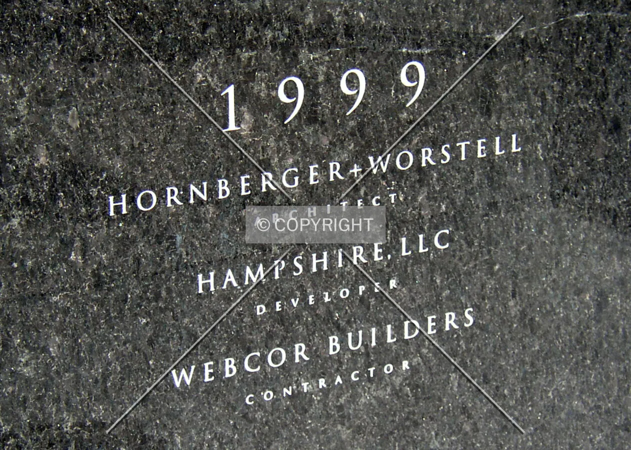 Dedication stone on the northwest corner off 3rd Street