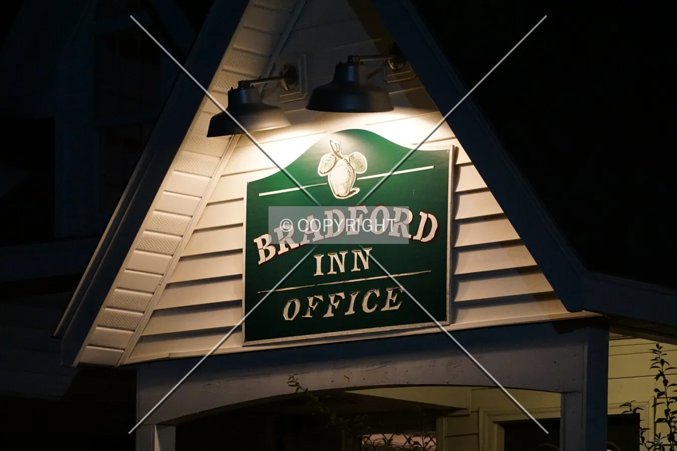 Office sign at night; October 20, 2016
