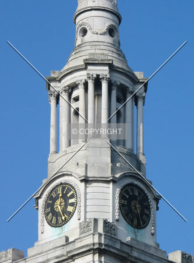 Detailed view of the clock and spire