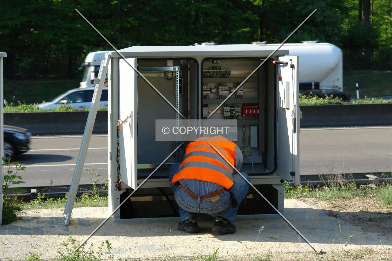 A worker working on a electric junction box