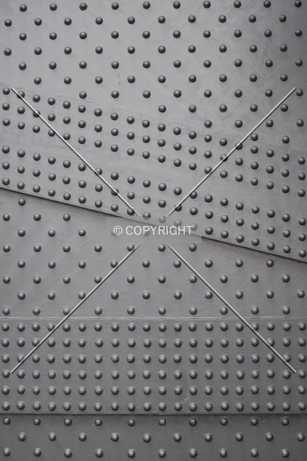 Riveted plate on the north side