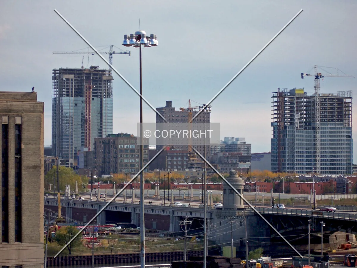 Looking southeast from the top of the South Gate Mall parking garage with 1401 South State is also seen under construction on the right