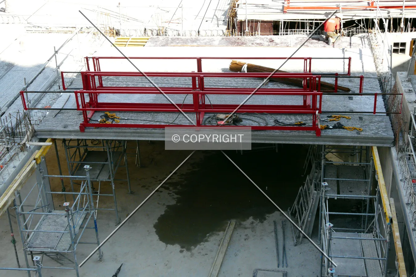 Hollow slabs placed on each side on precast beams