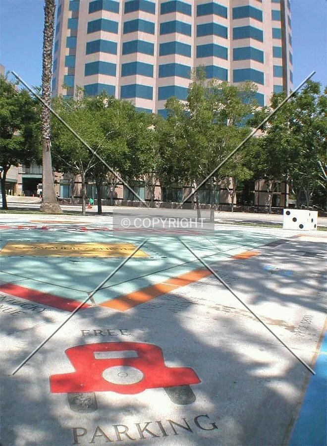 A giant Monopoly board in the park across the street
