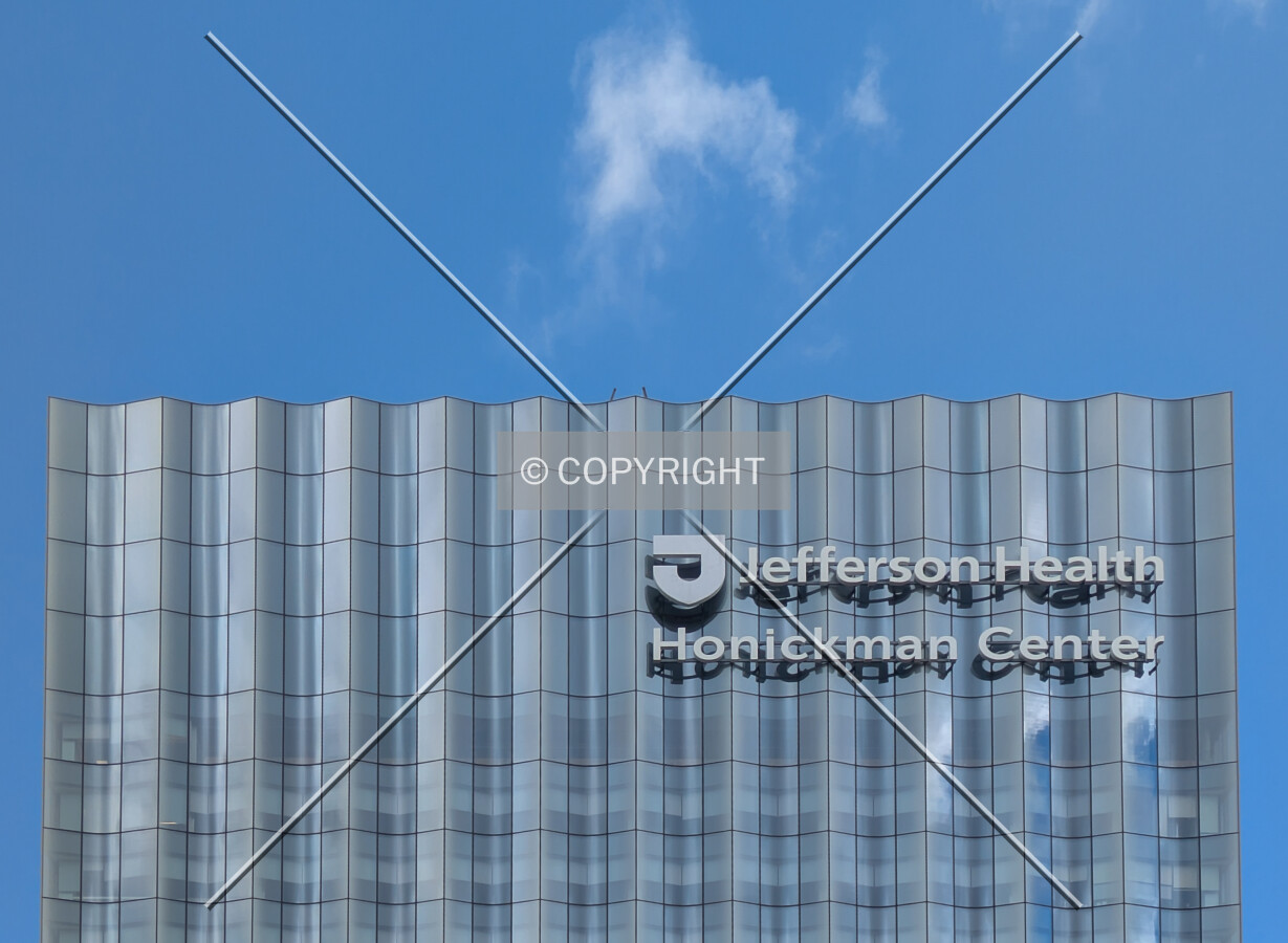 Top floors and signage from the south