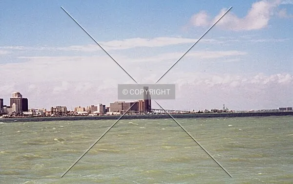 Corpus Christi skyline from the Southeast from a pier near downtown off of Shoreline Boulevard