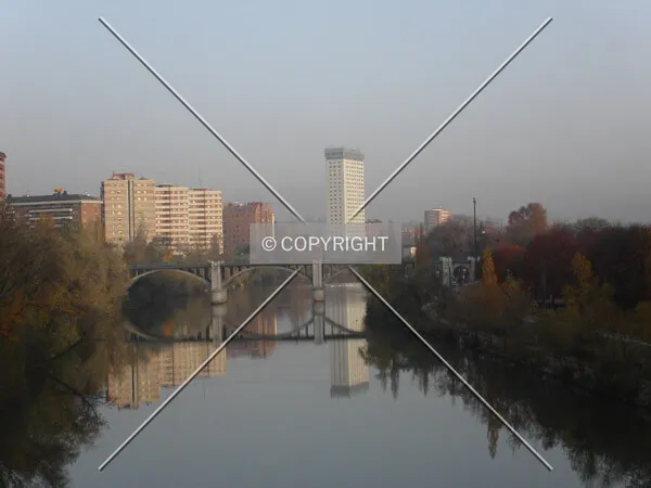 Building reflecting in the river