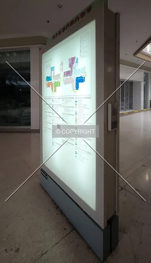 A directory sign in the closed Dillard's wing; October 28, 2023