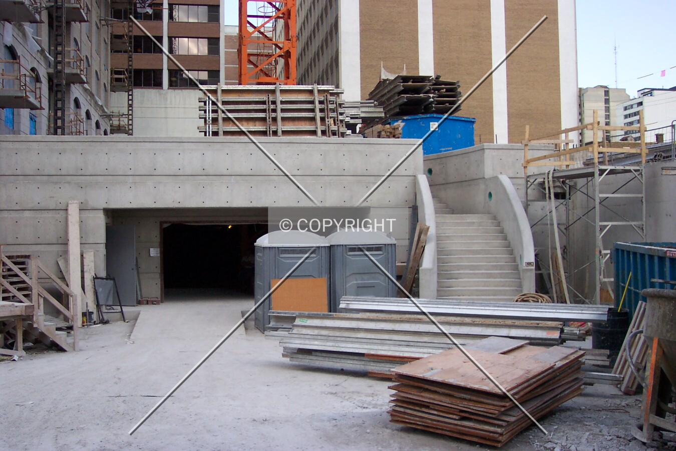 The entrance to the underground parking garage, located between the two towers