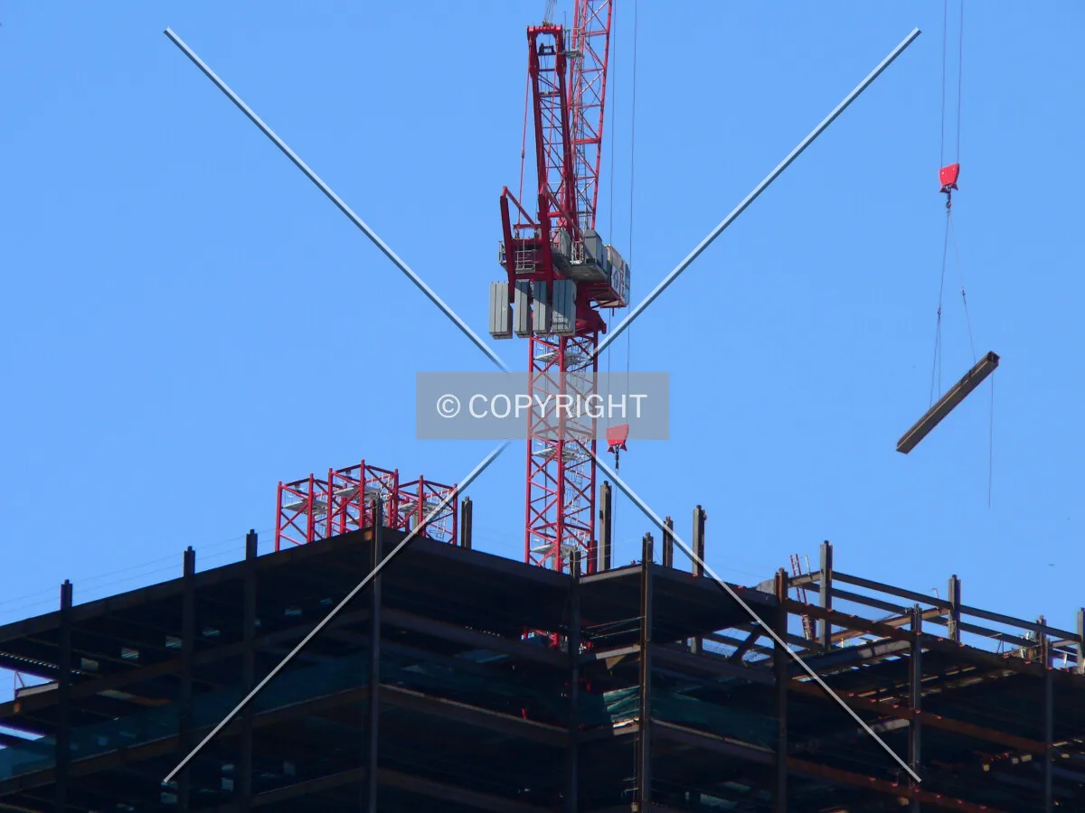 Hoisting a piece of steel into position