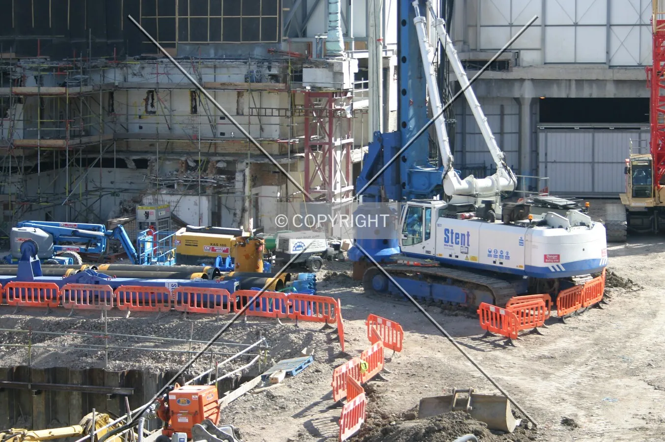 Elevated view east over the site showing piling progress