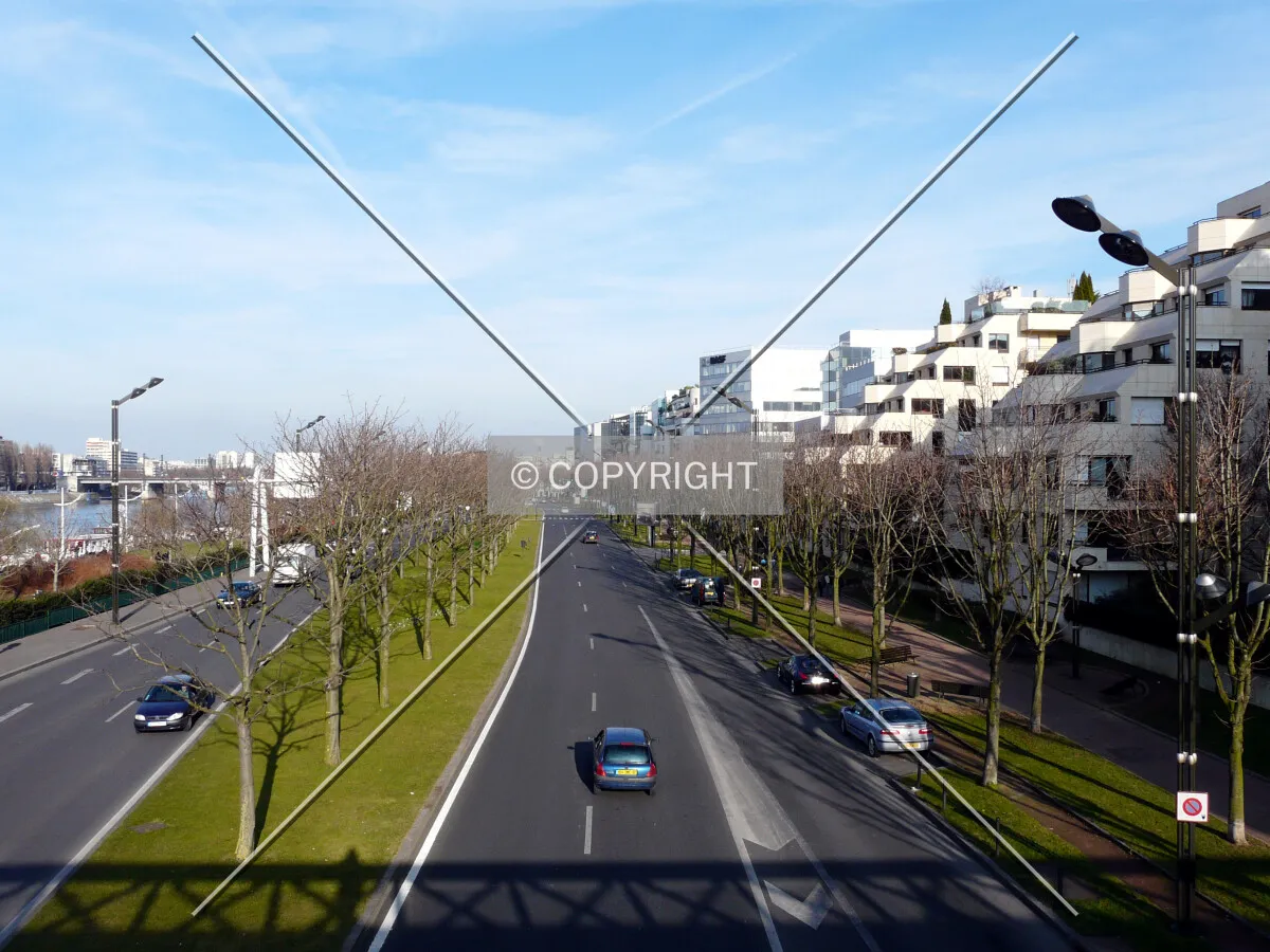 Looking west from a footbridge over the street