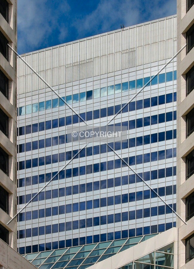 From Government Plaza, upper floors viewed through the towers of US Bank Plaza