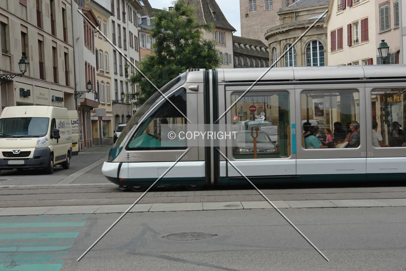 A tram is transporting people