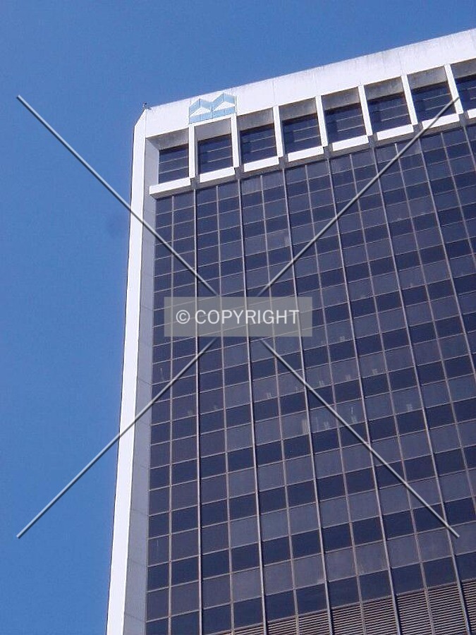 Bank's logo at top of east facade