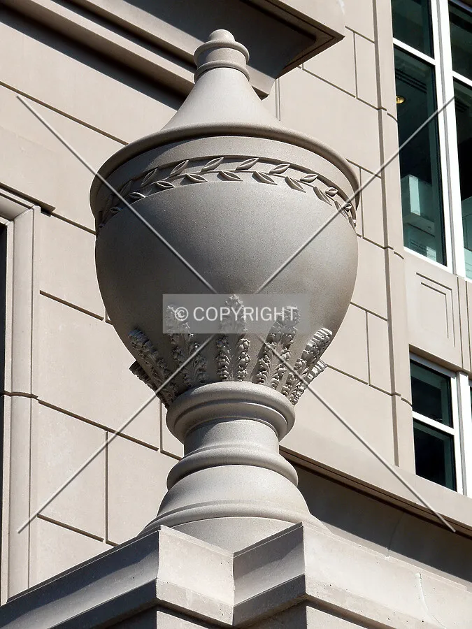 Urn atop the entryway wall